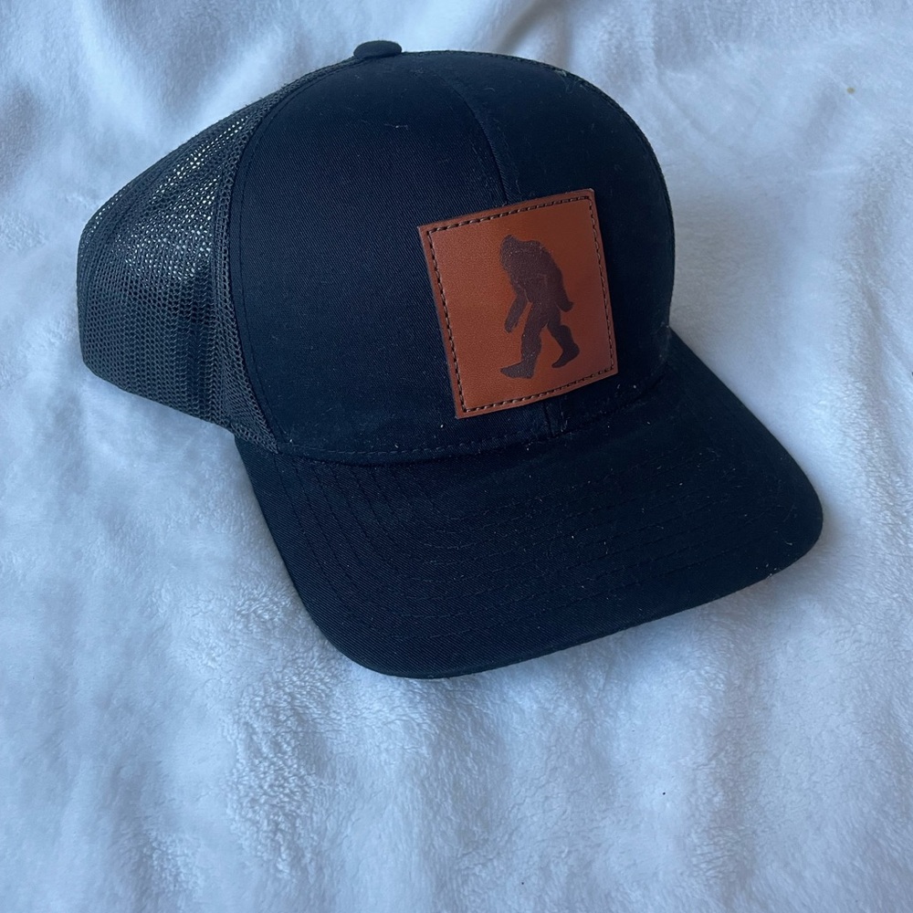 Sasquatch Leather patch/ black trucker hat
